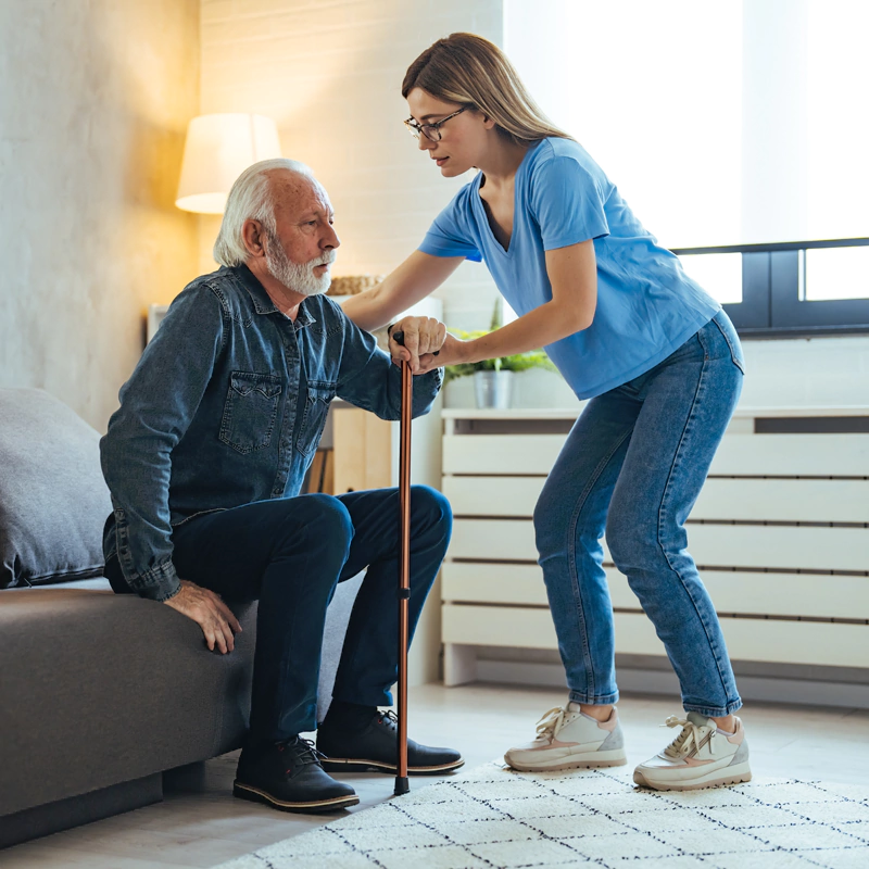 Support worker assisting participant with daily living tasks